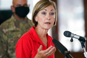 Iowa Gov. Kim Reynolds during a news conference in Cedar Rapids, Aug. 14, 2020.