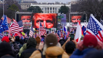 Trump supporters participate in a rally in Washington, Jan. 6, 2021.