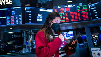 Trader Ashley Lara works on the floor of the New York Stock Exchange, Jan. 15, 2021.