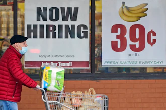 A man walks out of a Marc's store, Mayfield Heights, Ohio, Jan. 8, 2021.