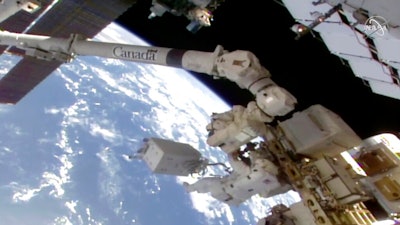 In this image taken from video, NASA astronaut Victor Glover makes his way to the International Space Station’s European lab, Jan. 27, 2021.