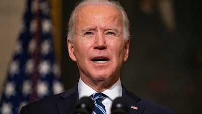 President Joe Biden speaks in the State Dining Room of the White House, Jan. 27, 2021.