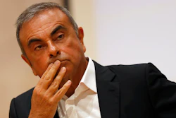 In this Sept. 29, 2020, file photo, former Nissan Motor Co. Chairman Carlos Ghosn holds a press conference at the Maronite Christian Holy Spirit University of Kaslik, as he launches an initiative to help Lebanon that is undergoing a severe economic and financial crisis, in Kaslik, north of Beirut, Lebanon. A former Nissan chief operating officer outlined in a Japanese court Tuesday, Jan. 12, 2021, the pains company officials took to hide star executive Carlos Ghosn’s pay, and how they had worried about his quitting for a rival.