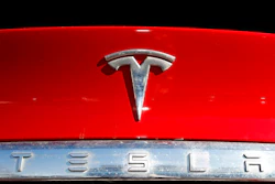 In this Feb. 2, 2020, file photo, the company logo appears on an unsold 2020 Model X at a Tesla dealership in Littleton, Colo. The U.S. government’s auto safety agency has rejected a request to investigate unintended acceleration in Tesla electric vehicles, saying the acceleration was caused by drivers pushing the wrong pedal.