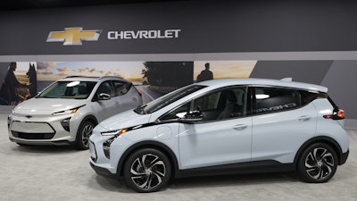 The 2022 Chevrolet Bolt EV, foreground, and EUV, Feb. 11, 2021, Milford, Mich.