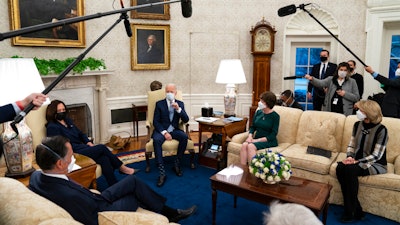 President Joe Biden and Vice President Kamala Harris in the Oval Office with, from left, Sen. Mitt Romney, R-Utah, Sen. Susan Collins, R-Maine, and Sen. Lisa Murkowski, R-Alaska, Feb. 1, 2021.