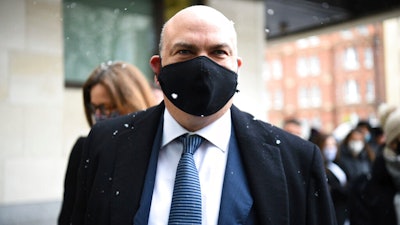 Michael Lynch arrives at Westminster Magistrates' Court, London, Feb. 8, 2021.