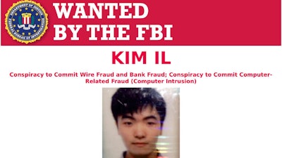 Wanted poster released by the Department of Justice showing Kim Il, who prosecutors say is a member of a North Korean military intelligence agency.