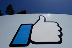 The 'Like' logo on a sign at Facebook headquarters, Menlo Park, Calif., April 25, 2019.