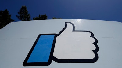 The 'Like' logo on a sign at Facebook headquarters, Menlo Park, Calif., April 25, 2019.