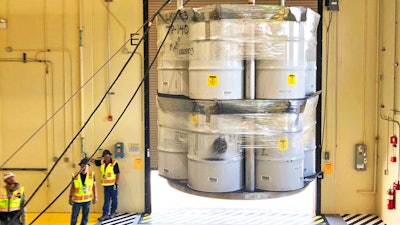 Barrels of radioactive waste are loaded for transport to the Waste Isolation Pilot Plant at the Radioactive Assay Nondestructive Testing facility in Los Alamos, N.M., April 2019.