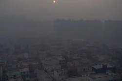 The morning sun seen through a blanket of smog outside New Delhi, India, Jan. 2, 2021.