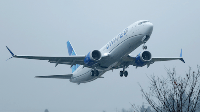 In this file photo, a United Airlines Boeing 737 Max airplane takes off in the rain, at Renton Municipal Airport in Renton, Washington.