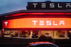 Street View Of Tesla Motors Showroom With Cars Inside And Illuminated Logo Brandin At Dusk London Uk 803666444 2125x1417 (1)