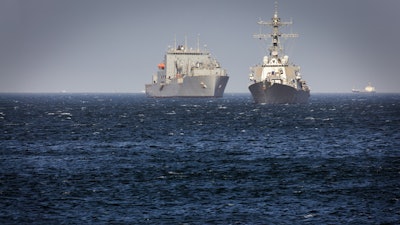 Two U.S. Navy ships off the coast of Yokosuka, Japan.