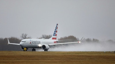 An American Airlines Boeing 737 Max takes off at Tulsa International Airport, Tulsa, Okla., Dec. 2, 2020.