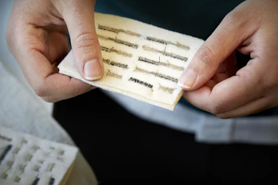 The dark yarn is the cellulose yarn and the lighter one is a commercially available silver-plated yarn, both of which are electrically conductive. The researchers have sewn the two threads separately into the fabric, in a special way that gives the fabric its thermoelectronic properties.