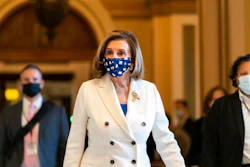 House Speaker Nancy Pelosi of Calif., walks from the House floor, during the vote on the Democrat's $1.9 trillion COVID-19 relief bill, on Capitol Hill on March 10 in Washington.