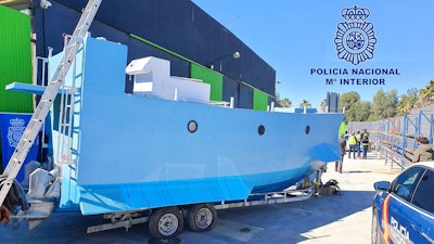 A homemade, semi-submersible submarine outside a warehouse in Malaga, Spain, March 12, 2021.