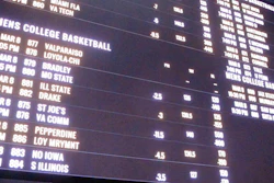 A betting board lists the odds on college basketball games at the Tropicana casino, Atlantic City, N.J., March 8, 2019.