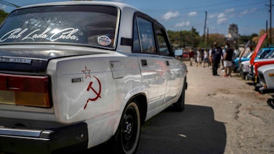 A Lada car is driven to the Lada Cuba Club meeting in Havana, March 21, 2021.