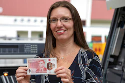 Sarah John, chief cashier at the Bank of England, holds the new 50-pound note featuring scientist Alan Turing, March 25, 2021.