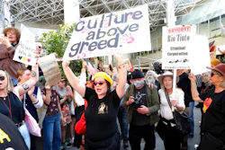 Protesters rally outside the Rio Tinto office in Perth, Australia, on June 9, 2020. Rio Tinto chairman Simon Thompson said Wednesday, March 3, 2021 he was accountable for the mining giant destroying sacred Indigenous sites in Australia to access iron ore and he will not seek reelection as a board director next year.