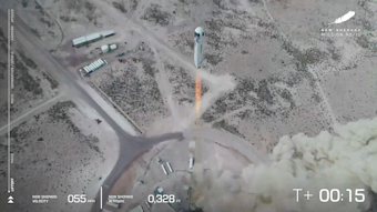 The New Shepard rocket lifts off during a test in West Texas, April 14, 2021.