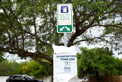 A parking area with charging stations for electric vehicles at a public park in Orlando, Fla., April 1, 2021.