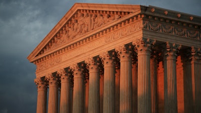 The U.S. Supreme Court seen at sunset in Washington, Oct. 4, 2018.