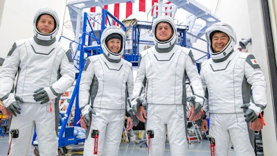 The crew for SpaceX's third astronaut launch to the International Space Station during a training session in Hawthorne, Calif.