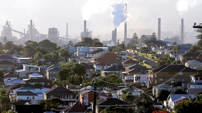 Chimneys at a steel factory in Port Kembla, Australia, July 2, 2014.