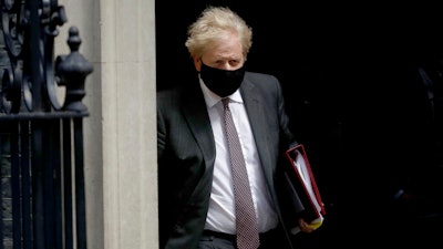 British Prime Minister Boris Johnson leaves 10 Downing Street, London, April 21, 2021.