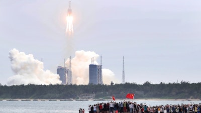 Long March 5B rocket carrying a module for a Chinese space station lifts off from the Wenchang Spacecraft Launch Site, April 29, 2021.