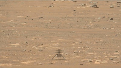Image from video showing the Mars Ingenuity helicopter on the surface of the planet, April 29, 2021.