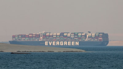 In this file photo, the Ever Given, a Panama-flagged cargo ship, is seen in Egypt's Great Bitter Lake.
