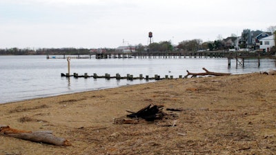 This Tuesday, April 19, 2021 photo shows the waterfront of Raritan Bay in Keyport, N.J. A Massachusetts company wants to build a high-voltage power line that would come ashore in Keyport and connect electricity from a future wind farm off the New Jersey coast to the onshore electrical grid.