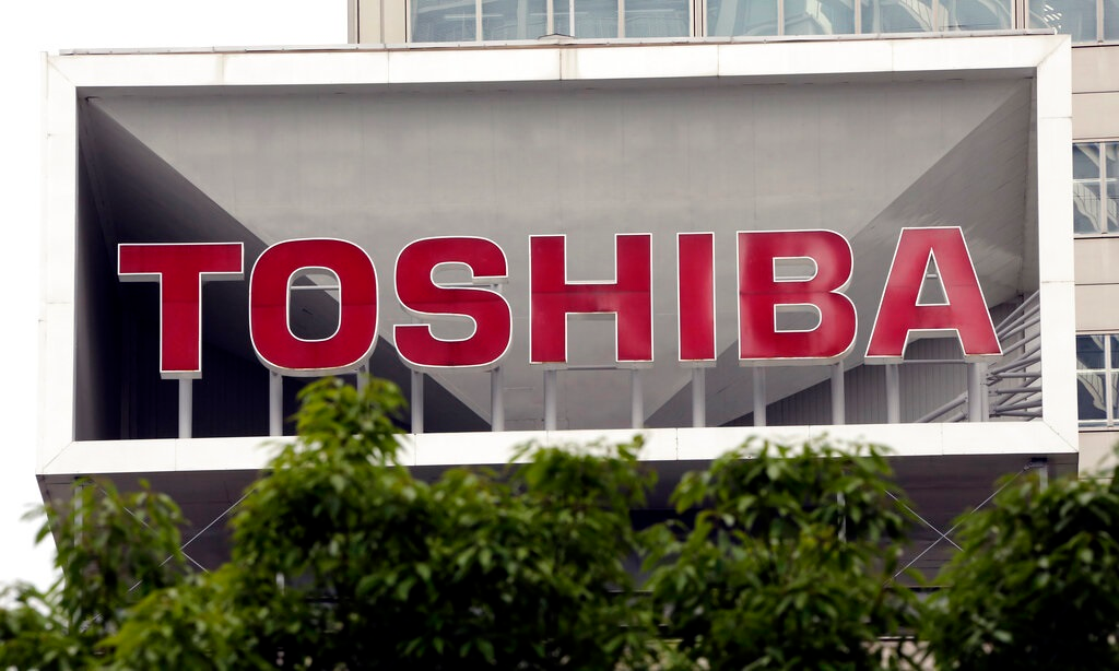 This May 26, 2017 file photo shows the company logo of Toshiba Corp. displayed in front of its headquarters in Tokyo.Trading in Toshiba stock was halted Wednesday, April 7, 2021 after the Tokyo-based technology conglomerate confirmed it had received a preliminary acquisition proposal. Toshiba Corp. said Tuesday, April 6 it had asked for more details on the proposal, was giving it &ldquo;careful consideration&rdquo; and would make an announcement &ldquo;in due course.&rdquo;