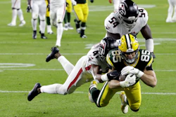 The Green Bay Packers' Robert Tonyan scores a touchdown in a game against the Atlanta Falcons, Oct. 5, 2020, Green Bay, Wis.