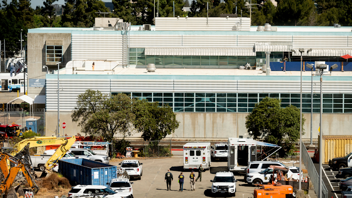 Law enforcement officers respond to the scene of a shooting at a Santa Clara Valley Transportation Authority facility, San Jose, May 26, 2021.