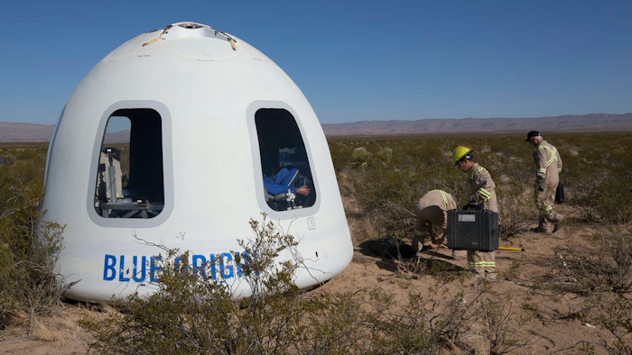 The first tourist to fly on a privately owned spaceship will ride in Blue Origin’s New Shepard Crew Capsule, seen here after a test flight in Texas.