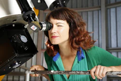 Lucianne Walkowicz looks at solar flares through a telescope at the Adler Planetarium's observatory in Chicago, Aug. 5, 2015.