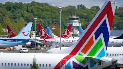 Boeing 737 Max airplanes parked in a storage lot, April 26, 2021, near Boeing Field, Seattle.