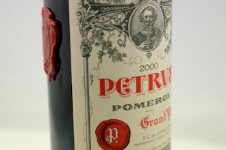 A bottle of Petrus red wine that spent a year orbiting the world in the International Space Station pictured in Paris, May 3, 2021.