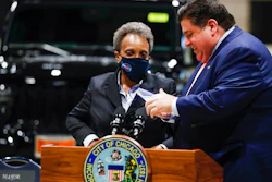 Governor J.B. Pritzker and Mayor Lori Lightfoot talk following a news conference, McCormick Place, Chicago, May 4, 2021.