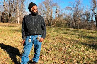 Clyde Robinson, 80, speaks with a reporter while standing on his land, Memphis, Jan. 28, 2021.