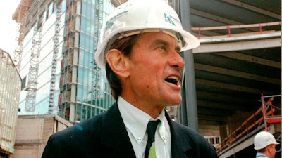 Architect Helmut Jahn tours a construction site in Berlin, July 15, 1998.