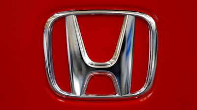 Honda logo on a vehicle at the Pittsburgh Auto Show, Feb. 14, 2013.