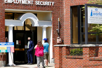 Job seekers outside the New Hampshire Works employment security job center in Manchester, May 10, 2021.