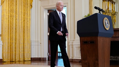 President Joe Biden arrives to speak about distribution of COVID-19 vaccines, East Room, White House, May 17, 2021.